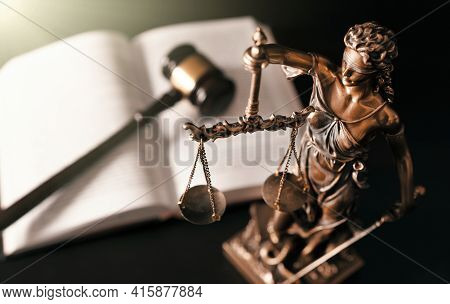Lady Justice. Statue Of Justice In Library. Legal And Law Background Concept