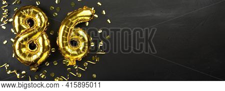Golden Foil Balloon Number Eighty Six. Birthday Or Anniversary Card With The Inscription 86. Black C