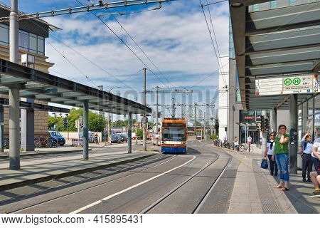Mannheim, Germany - July 2019: People Waiting For Cable Car At Station In Front Of Mannheim Central 