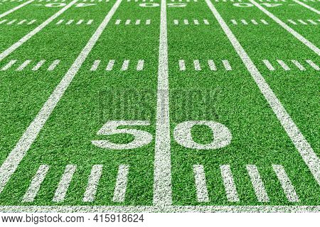 50 Yard Line Of American Football Field. View From With Sidelines