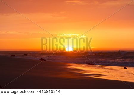 Ocean Sunset On The Beach And The Pacific Ocean In Mancora, Peru