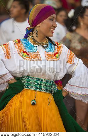 Puerto Ayora, Galapagos, February 13: Unidentified Woman With Traditional Costume Dancing In The Str