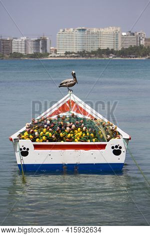 Margarita, Venezuela, April 15: Pelican Standing On A Fisher Boat In The Bay Of Pampatar. Isla Marga