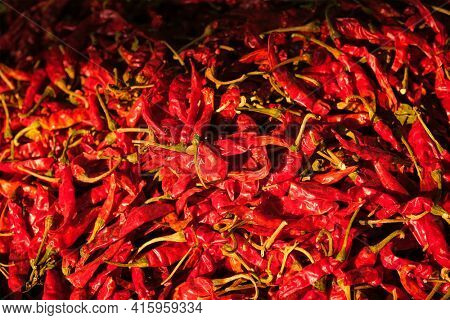 Red spicy chili peppers close up