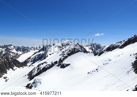 Mountain Wildspitze, Snow Panorama And Blue Sky In Tyrol Alps, Austria