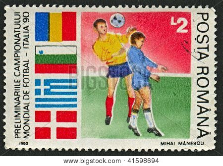 ROMANIA - CIRCA 1990: A stamp printed in Romania shows image of the Italian Football World's Championship (1990), Romania vs. Greece match, circa 1990.