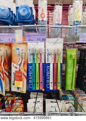 Tivat, Montenegro - 29 July 2020: Curaprox Toothbrushes Hang In A Shop Window In A Supermarket.