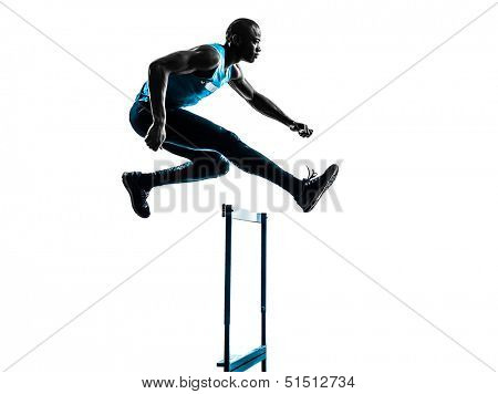 one african man hurdler running  in silhouette studio isolated on white background
