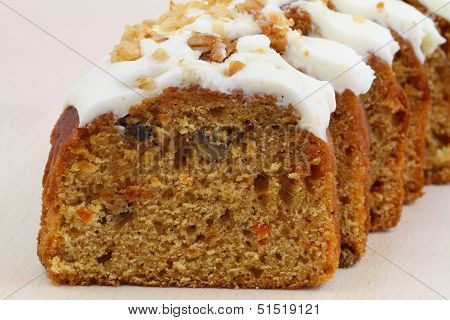 Carrot and walnut cake with marzipan icing, close up