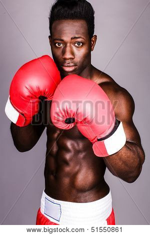Muscular Male Boxer With Serious Look On Face