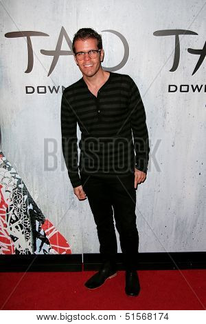 NEW YORK-SEP 28: Blogger Perez Hilton attends the grand opening of TAO Downtown at the Maritime Hotel on September 28, 2013 in New York City.