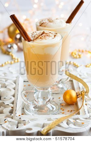 Eggnog with Cinnamon Sticks