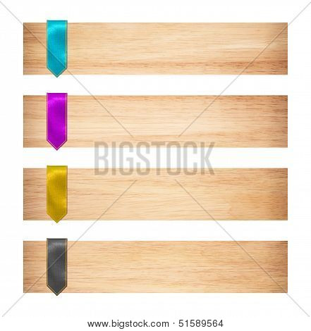 Four plates with multicolored ribbons.