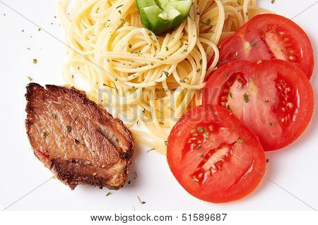Pork with pasta and tomatoes