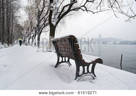 Snow-covered Bench On The Banks Of West Lake, Hangzhou, China