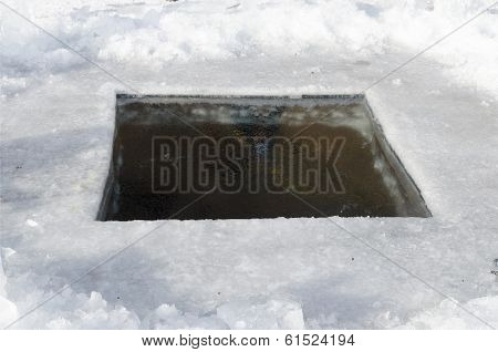 Ice hole for scuba divers in Lake Baikal