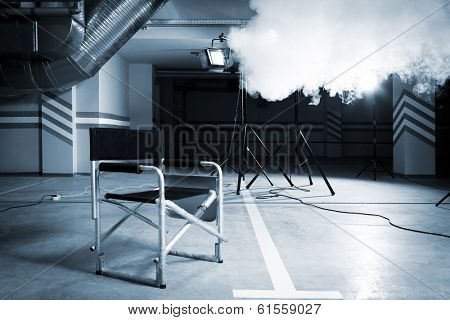 Chair for director in studio on a background of a smoke