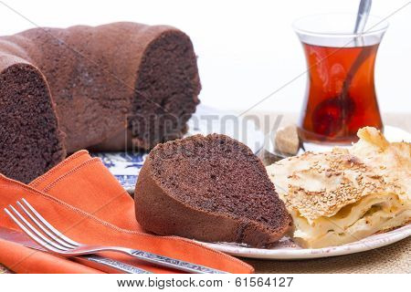 Freshly Baked Borek And Chocolate Cake At A Party