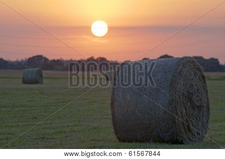 Straw Bale By Sunset