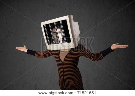 Business man with monitor screen on his head traped into a digital system concept