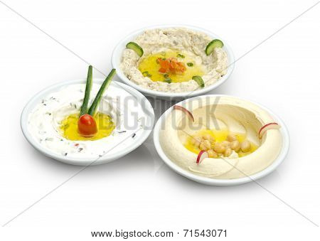 Arabic traditional Hummus , labneh and mtabbal isolated