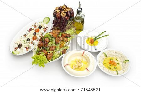 Arabic food of Hommos, Labneh,Fattoush, & Dates served during Ramdan