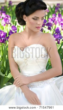 Beautiful bride in spring garden