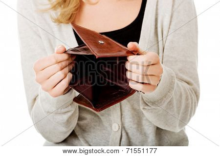 Young caucasian woman with empty wallet - broke
