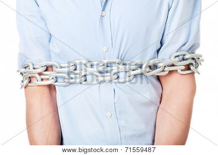 Businessman slave tied up with chain