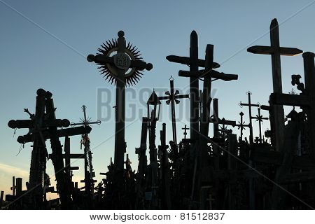 SIAULIAI, LITHUANIA - AUGUST 1, 2013: Wooden crosses at the Hill of Crosses, the most important Lithuanian Catholic pilgrimage site located near the town of Siauliai in Northern Lithuania.
