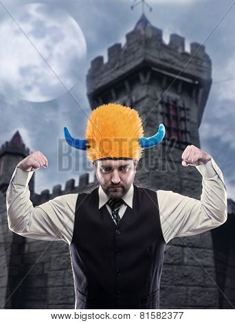 Businessman in party helmet 
