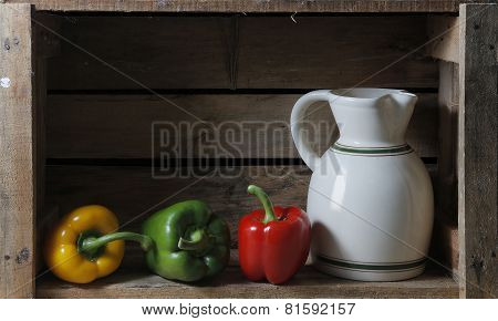 Bodegon With A Pitcher And Three Peppers