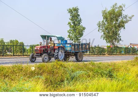 Tractor With Trailer On The Highway