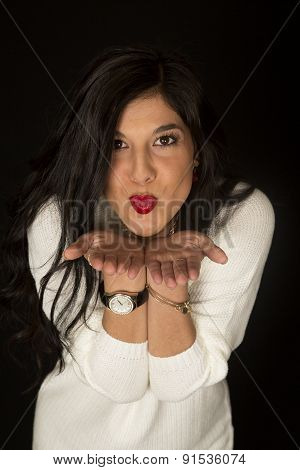 Fun Kissing Expression On A Dark Complected Beautiful Female Model