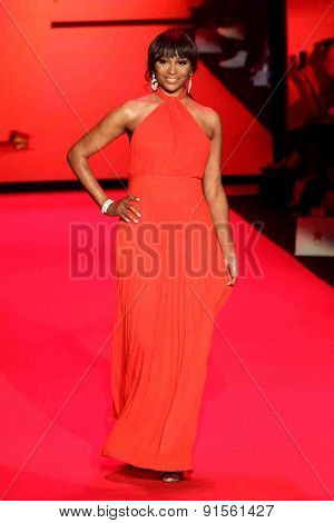 NEW YORK-FEB 12: TV personality Cynthia Bailey wears Jovan O'Connor at Go Red for Women-The Heart Truth Red Dress Collection at Mercedes-Benz Fashion Week on February 12, 2014 in New York City.
