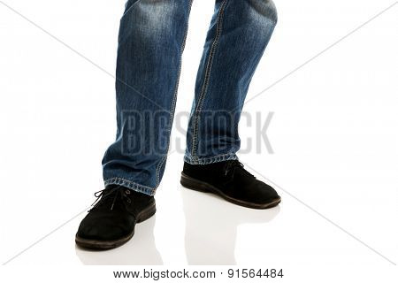 Close up on a man in casual clothes.