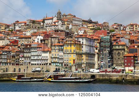 The Ribeira esplanada and the river Douro. Porto is a popular tourist destination in the north of Portugal.
