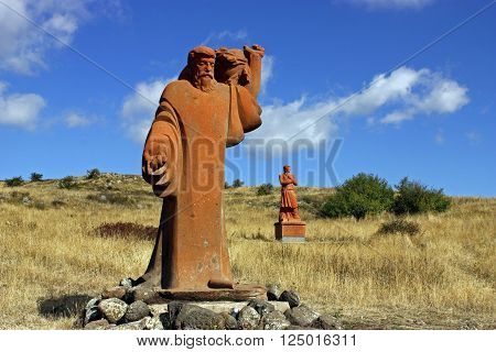 MOUNT ARAGATS,ARMENIA - OCTOBER 02:Statues creator Armenian Alphabet - Mesrop Mashtots and his disciple on Mount Aragats park of letters (Armenian Alphabet)Armenia on October 02,2011.