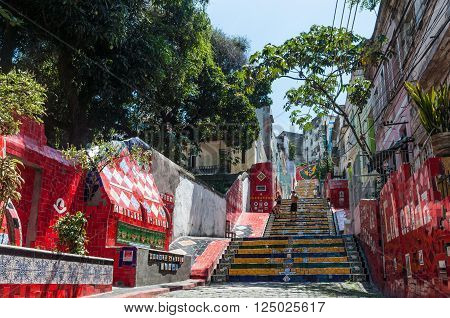 Rio de Janeiro, Brazil - December 21, 2012: Tourists visiting the Selaron stairway in Rio de Janeiro, Brazil. The stairway is famous work of Chilean artist Jorge Selaron.