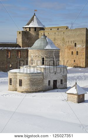 St. Nicholas Church on the background Proviantskaya tower winter day. Ivangorod, Russia