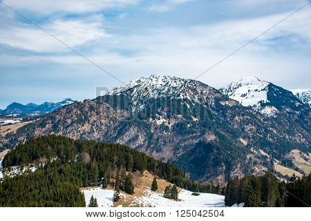 fir trees and mountains in Germany in early spring