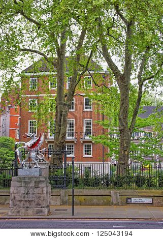 LONDON ENGLAND - APRIL 29 2011: Silver Dragon boundary mark in the City of London in London in England. It shows the boundaries of the City of London. It is placed at Victoria Embankment