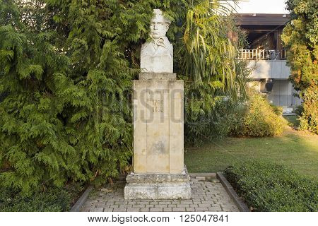 SOCHI, RUSSIA - Nobyar 06, 2015: Monument to Pushkin A.S. against trees. Sochi, Russia