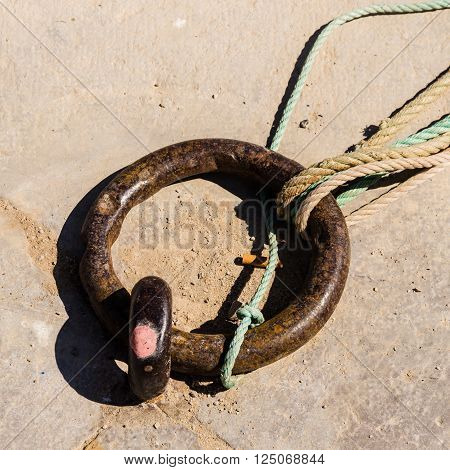 ring and ropes, symbol of travel and sea