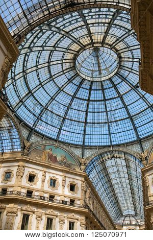 Milan, Italy - September 21, 2016: View of the glass dome at Galleria Vittorio Emanuele II, which is one of the world's oldest shopping malls, housed within a four-story double arcade in  Milan