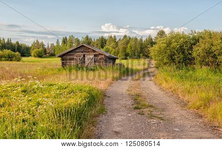 Traditional hay barn near Kalix typical for county Norrbotten in northern Sweden