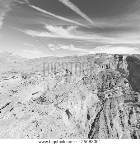 In Oman  The Old Mountain Gorge And Canyon The Deep Cloudy Sky