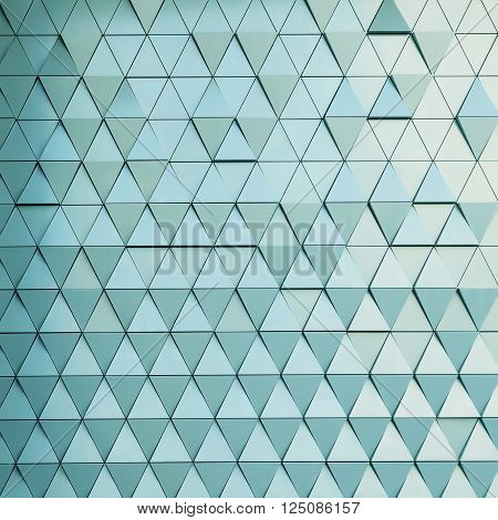Abstract close-up view of modern aluminum ventilated facade of triangles