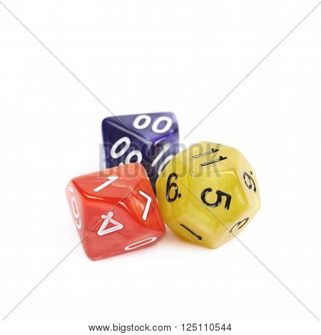 Pile of colorful roleplaying polyhedral dices isolated over the white background