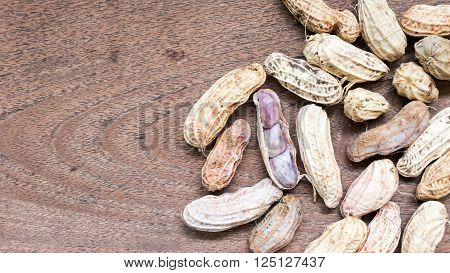 A pile of Boiled Peanuts on wooden table background.